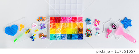 Aqua beads for the development of fine motor skills of children web banner top view Aqua beads for the development of fine motor skills of children web banner top view 117551057