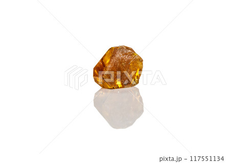 Macro yellow diamond mineral stone on white background Macro yellow diamond mineral stone on white background 117551134