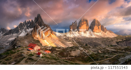 Aerial view of mountains, beautiful house and church at sunset 117551543