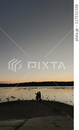 This is a detailed closeup image of a door that has a hole in it 117552108