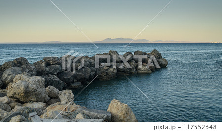 Large rocks formation near sea shore Large rocks formation near sea shore 117552348