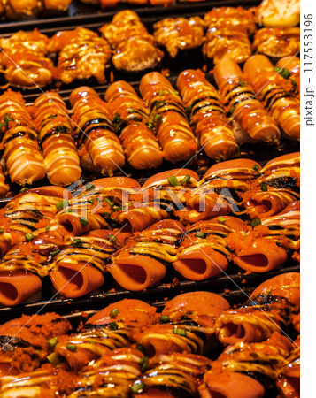 Grilled Sausage and Seaweed Rolls at a Night Market Grilled Sausage and Seaweed Rolls at a Night Market 117553196