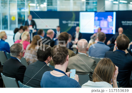 Business professionals attending a conference seminar 117553639