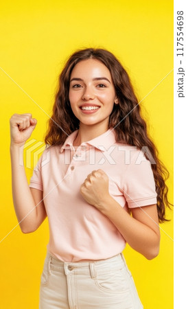 A woman in a pink polo shirt and jeans is smiling, AI 117554698