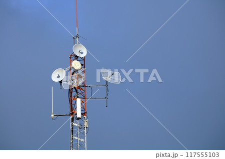 Radio Antenna Tower Against Blue Sky Radio Antenna Tower Against Blue Sky 117555103