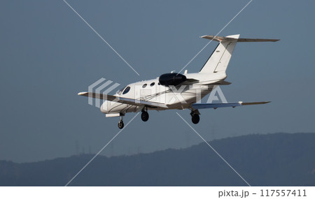 Landing small private passenger plane Landing small private passenger plane 117557411