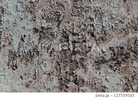 Background texture of a peeling wall due to weathering 117559385