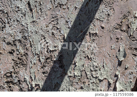 Background texture of a peeling wall due to weathering Background texture of a peeling wall due to weathering 117559386