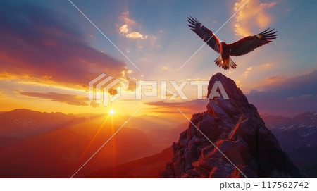 Majestic golden eagle soaring the sky above high rocky mountain in the evening or morning 117562742