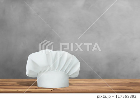 Wooden table with empty space and cook hat Wooden table with empty space and cook hat 117565892