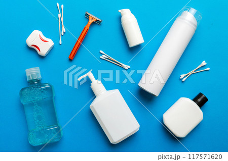 Mockup for bathing products top view flat lay, spa razor, toothpaste, soap, gel and other various accessories. Cosmetics for skin health. Bath Mockup for your logo 117571620