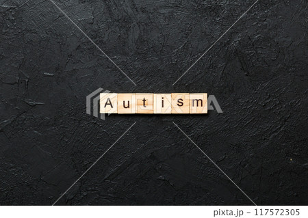 autism word written on wood block. autism text on table, concept autism word written on wood block. autism text on table, concept 117572305