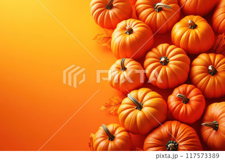 Jack o lantern halloween pumpkin on orange isolated background for mockup Jack o lantern halloween pumpkin on orange isolated background for mockup 117573389