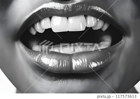 The mouths of women who wear natural Black and white photo of woman smiling The mouths of women who wear natural Black and white photo of woman smiling 117573613