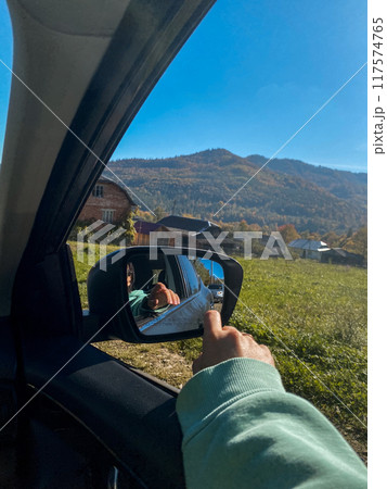 Autumn Reflection in Car Side Mirror Autumn Reflection in Car Side Mirror 117574765