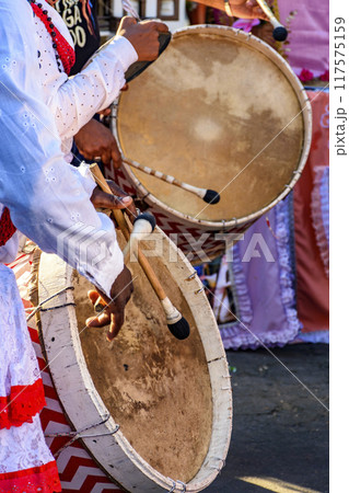 Colorful drummers during a religious celebration 117575159