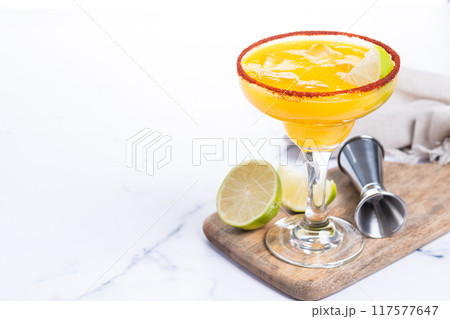Fresh mango cocktail. Mexican mango cocktail isolated on white background Fresh mango cocktail. Mexican mango cocktail isolated on white background 117577647