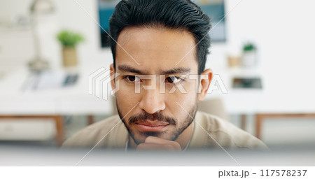 Business man, thinking and ideas on computer for website design, creative vision and solution at marketing agency. Young worker or designer on desktop for startup project, branding or problem solving 117578237