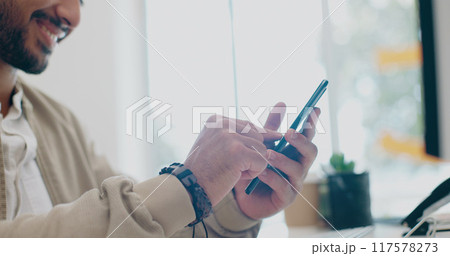 Happy man, phone in office and scroll on social media, email or post for business networking. Hands typing, good news and businessman with mobile app on smartphone, chat online and smile at work desk Happy man, phone in office and scroll on social media, email or post for business networking. Hands typing, good news and businessman with mobile app on smartphone, chat online and smile at work desk 117578273