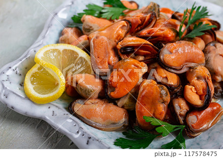 mussels no shell, boiled, mussels, peeled, in a bowl, with lemon and parsley, Chilean mussels, top view, no people, mussels no shell, boiled, mussels, peeled, in a bowl, with lemon and parsley, Chilean mussels, top view, no people, 117578475