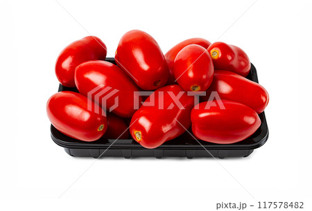 plum-shaped tomatoes, fresh, in a black plastic container, on a white background, isolate, 117578482