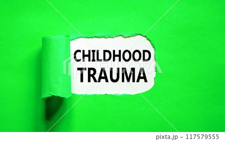Childhood trauma symbol. Concept words Childhood trauma on beautiful white paper. Beautiful green paper background. Business psychology childhood trauma concept. Copy space. 117579555
