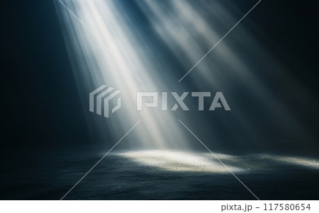 One ray of light against a dark background 117580654