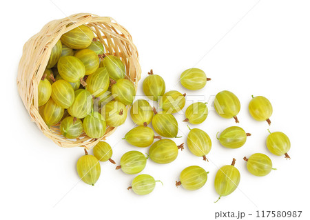 Green gooseberry in a wicker basket isolated on white background. Top view. Flat lay. 117580987