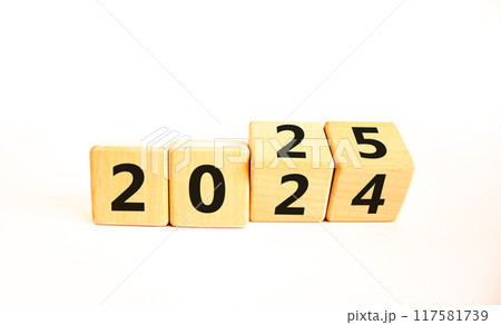 Business concept of 2025 new year symbol. Beautiful turned wooden cube and changed number 2024 to 2025. Beautiful white table white background, copy space. Business 2025 happy new year concept. 117581739