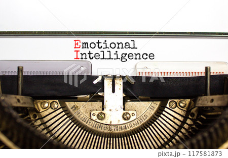 EI emotional intelligence symbol. Concept words EI emotional intelligence on white paper typed on retro typewriter. Beautiful background. Business EI emotional intelligence concept, copy space. 117581873