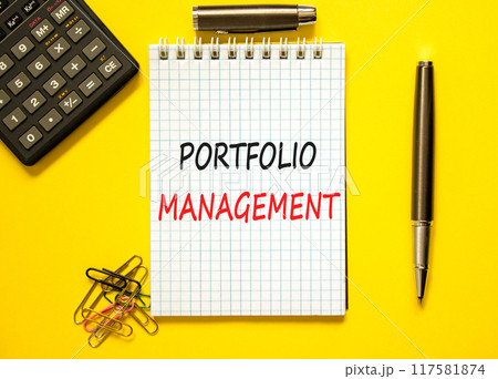 Portfolio management symbol. Concept words Portfolio management on beautiful white note. Beautiful yellow paper background. Calculator. Black pen. Business Portfolio management concept. Copy space. 117581874