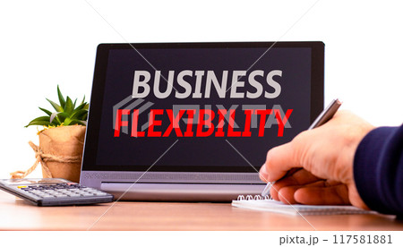 Business flexibility symbol. Concept words Business flexibility on beautiful black pad. Beautiful white background. Businessman hand. Calculator. Business flexibility concept. Copy space. Business flexibility symbol. Concept words Business flexibility on beautiful black pad. Beautiful white background. Businessman hand. Calculator. Business flexibility concept. Copy space. 117581881