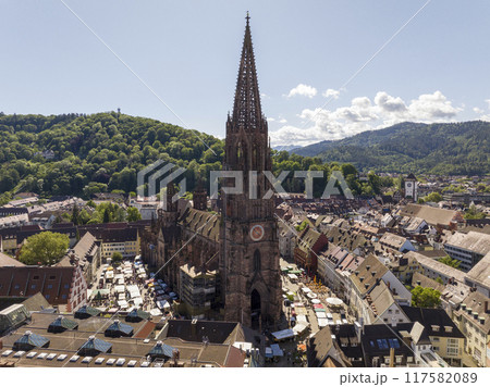 Freiburg im Breisgau, Germany at Sunrise. Aerial Drone Shot on Freiburger Dom Cathedral. 4k Drohne Footage Freiburg im Breisgau, Germany at Sunrise. Aerial Drone Shot on Freiburger Dom Cathedral. 4k Drohne Footage 117582089