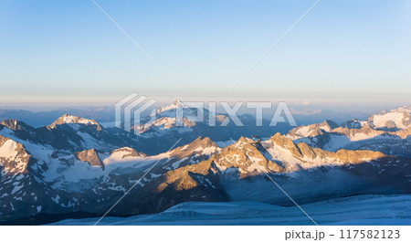 mountain peaks in morning dawn light, panoramic natural landscape mountain peaks in morning dawn light, panoramic natural landscape 117582123