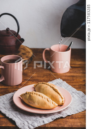 Two Cabbage Mini Pies on Plate 117583285