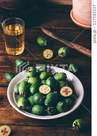 Fresh picked feijoa fruits on a plate 117583337