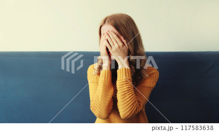 Upset sad crying woman while experiencing mental suffering, depression, fatigue, emotional stress Upset sad crying woman while experiencing mental suffering, depression, fatigue, emotional stress 117583638