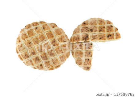 Pita flat-bread toasted of a grid pattern over white Pita flat-bread toasted of a grid pattern over white 117589768