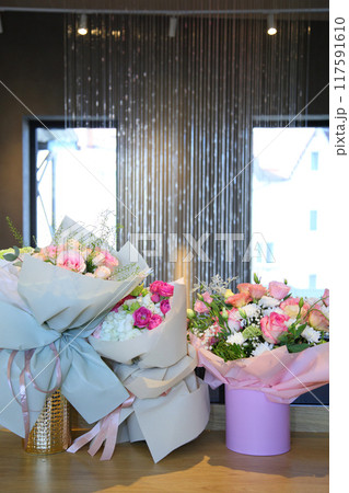 Restaurant interior. Photo zone in the restaurant. Floral design in a restaurant. Restaurant interior. Photo zone in the restaurant. Floral design in a restaurant. 117591610