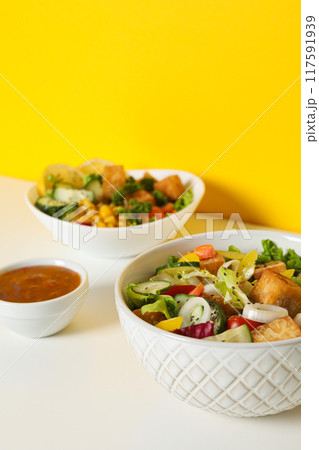 Fried tofu salad with sauce and vegetables Fried tofu salad with sauce and vegetables 117591939