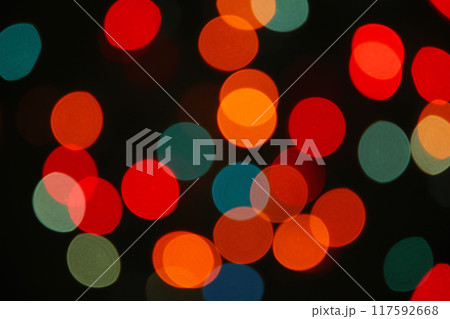 Christmas light background. Holiday glowing backdrop. Defocused Background With Blinking Stars. Blurred Bokeh. Christmas light background. Holiday glowing backdrop. Defocused Background With Blinking Stars. Blurred Bokeh. 117592668