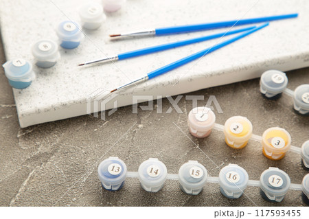Paints for drawing pictures by numbers on grey background Paints for drawing pictures by numbers on grey background 117593455