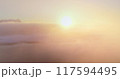 Colorful sunrise over Antarctica ocean coast. Aerial drone flight above telecom engineer maintenance cell signal antenna from polar base station. Morning orange bright fog background. Nature wallpaper 117594495