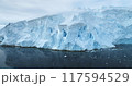 Global Warming and Climate Change - Giant glacier towers in Antarctica. Aerial drone view arctic nature winter landscape. Melting ice floes fjord in cold polar ocean. Global issue of melting icebergs 117594529