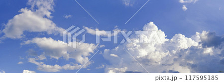 Banner Tropical summer blue sky fluffy white cloud summertime on light sunny day cloudscape. Panoramic Clear bright blue skyline spring sunlight climate background. Heaven blue ecology for web banner 117595185