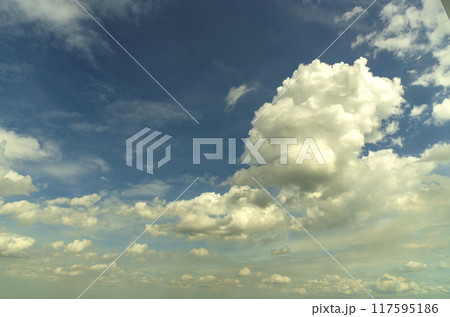 Tropical summer blue sky fluffy white cloud summertime on light sunny day cloudscape. Clear bright blue skyline spring sunlight climate background. Heaven blue environment ecology high scenic nature. 117595186