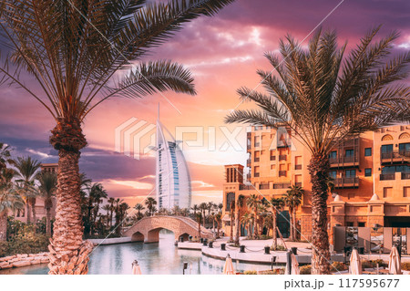 Dubai, United Arabian Emirates. View of Madinat Jumeirah Arabian Resort. Beautiful view of hotel Burj Al Arab from Madinat Jumeirah in sunny summer day. Luxury resort in Dubai 117595677