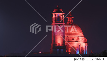 New Delhi, Delhi, India. Close up of Rashtrapati Bhavan, Bell tower and Ministry of External Affairs in Kartavya Path, Rajpath Area. Rashtrapati Bhavan in evening night illumination lights lighting New Delhi, Delhi, India. Close up of Rashtrapati Bhavan, Bell tower and Ministry of External Affairs in Kartavya Path, Rajpath Area. Rashtrapati Bhavan in evening night illumination lights lighting 117596601
