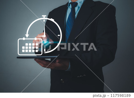 Businessman marking dates on virtual calendar, Time management concept, Planning work to increase efficiency, Business project planning, Effective time management and reduce working time. 117598189
