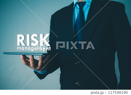 Person use tablet with virtual icon of Risk analysis in business decisions, Risk management concept, Risk control and management strategies for risky businesses. Person use tablet with virtual icon of Risk analysis in business decisions, Risk management concept, Risk control and management strategies for risky businesses. 117598190